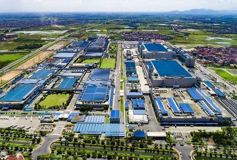 Khu công nghiệp hiện đại, nhà máy hoặc hình ảnh cảng logistics.